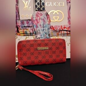 Red Designer Women's Clutch With Hardware That Says Gucci